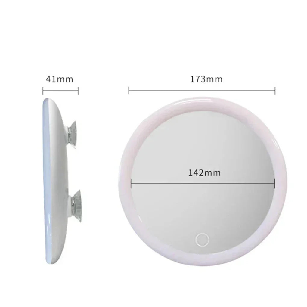 Compact 10x magnifying LED mirror for detailed facial care, featuring a strong suction base for stability.