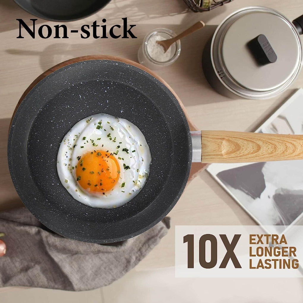 Sleek black 12-piece nonstick granite coated cookware set, a modern kitchen essential for durable cooking.