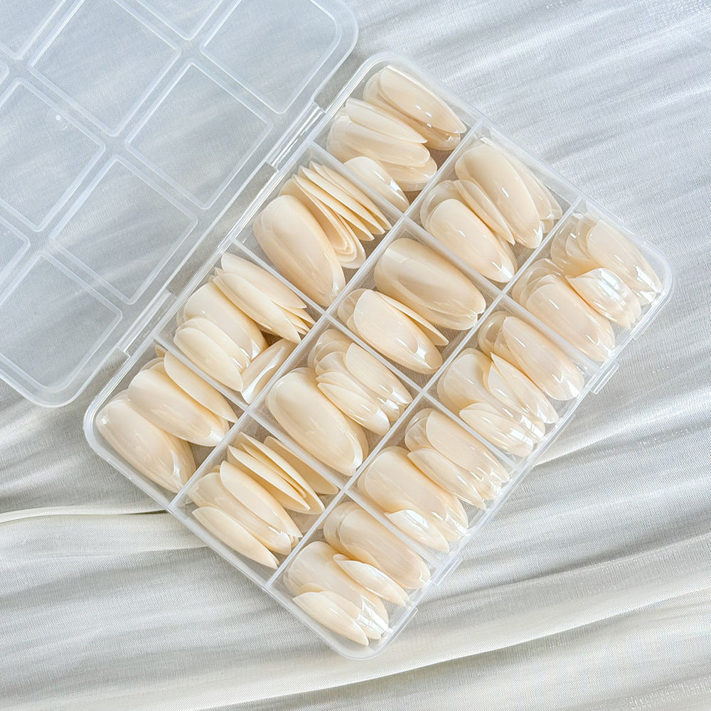 Clear false nail tips for women, 144 reusable press-on nails perfect for custom nail art designs.