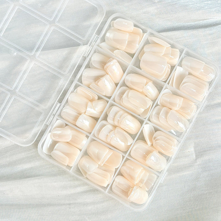 Versatile 144-pack clear false nail tips for women's beauty, perfect for press-on applications.