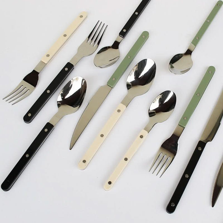 Stylish engraved stainless steel flatware set, 24 pieces for a beautiful table setting.