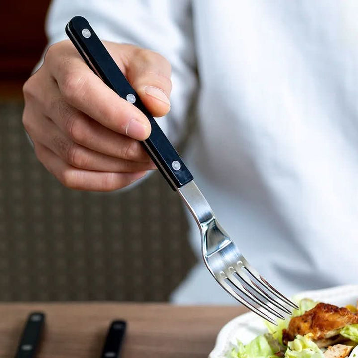 Complete 24-piece engraved stainless steel cutlery set, enhancing any kitchen & dining experience.