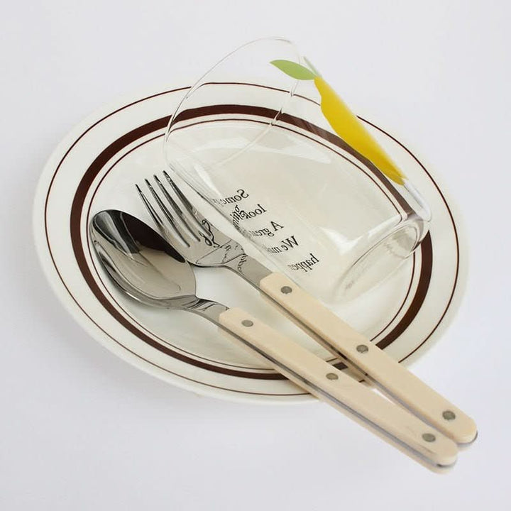 High-quality 24-piece engraved stainless steel flatware set, enhancing your dining table elegance.