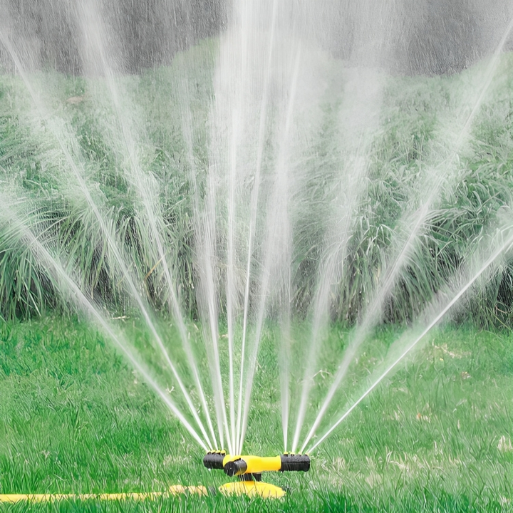 Adjustable nozzle rotating garden sprinkler for customizable lawn watering, ensuring optimal water distribution.