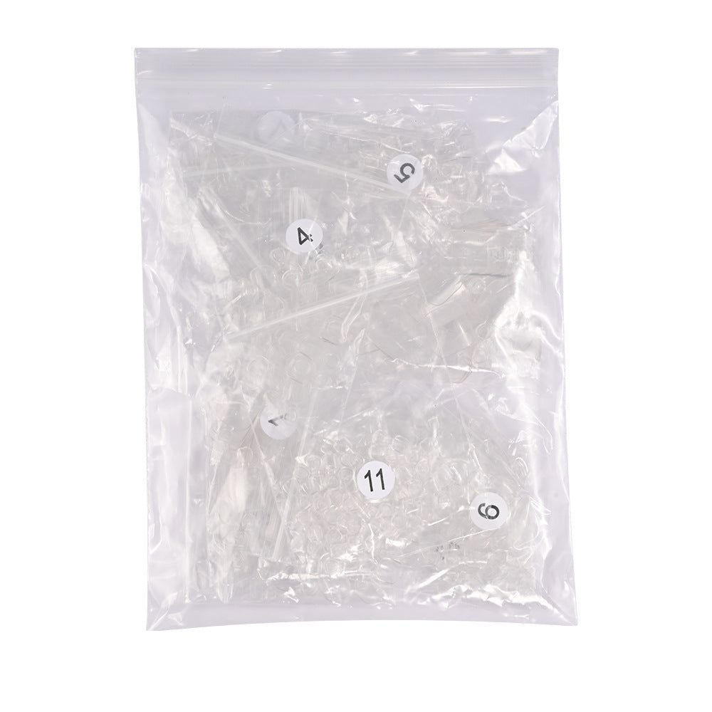 Bulk pack of 600 clear gel toenail tips for salon-grade pedicures, extensions, & DIY nail art supplies.
