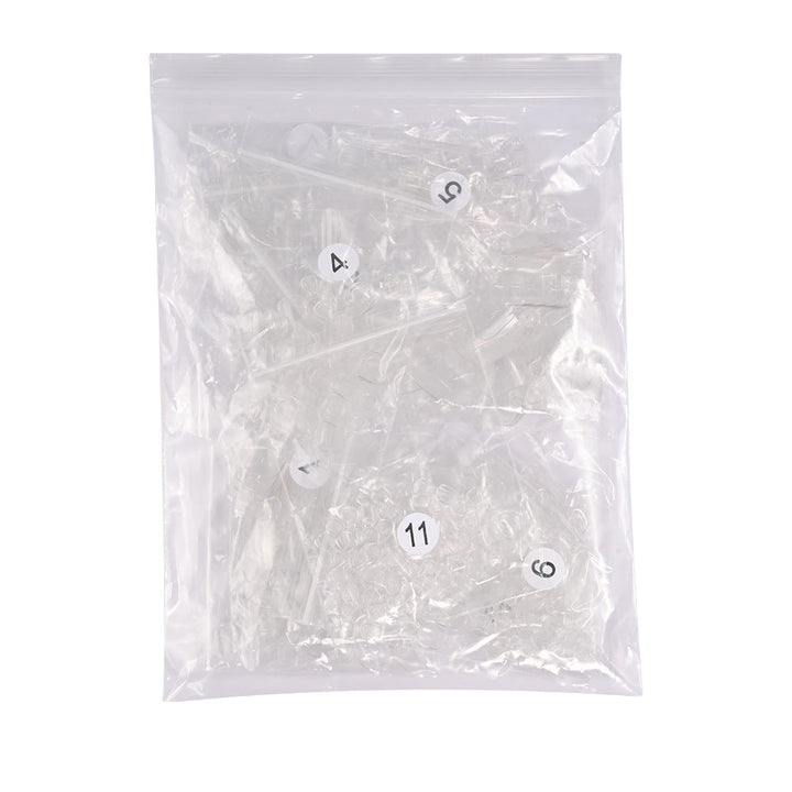 Bulk pack of 600 clear gel toenail tips for salon-grade pedicures, extensions, & DIY nail art supplies.