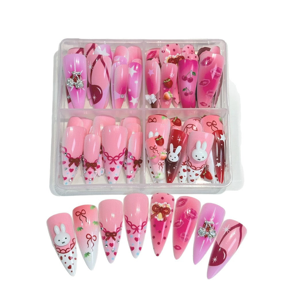 Women's 96 Pcs cartoon press-on nail art set; decorative fake nails offer a fun, instant manicure with diverse designs.