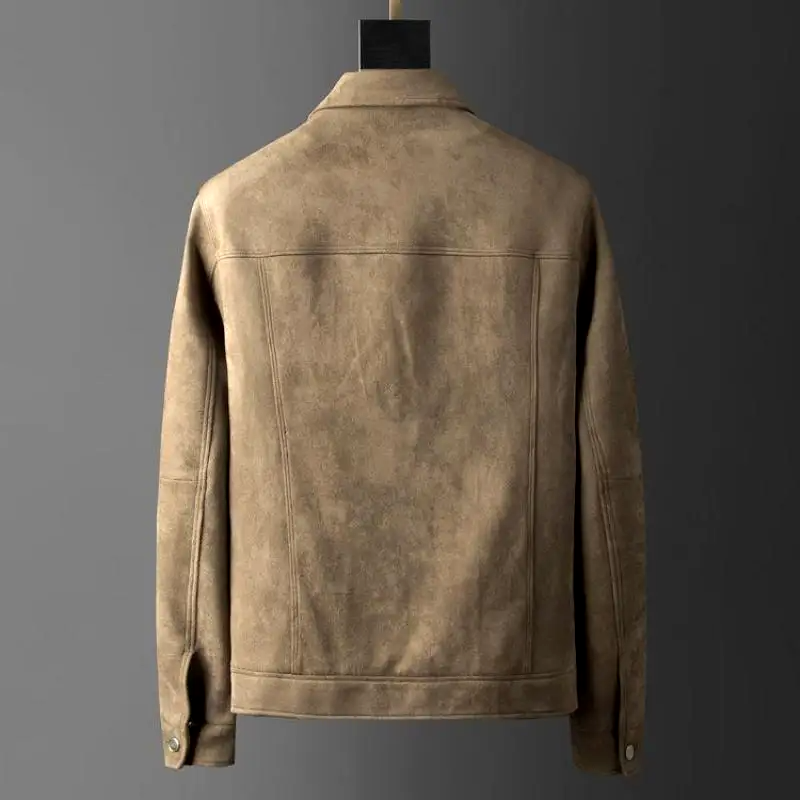 A fashionable man in a gray classic urban jacket, ideal for modern menswear and stylish outerwear.