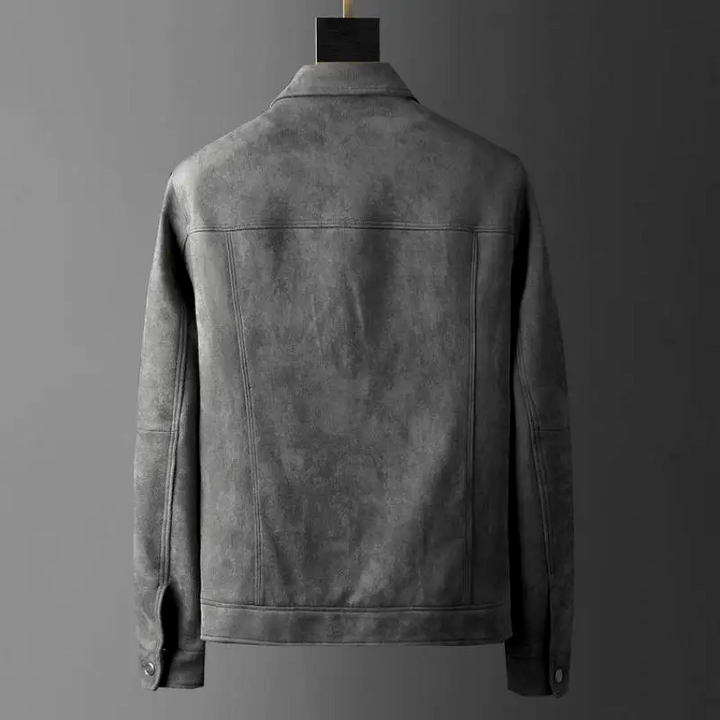 A man walking in a city, sporting a stylish men's classic urban jacket, ideal for modern urban fashion.