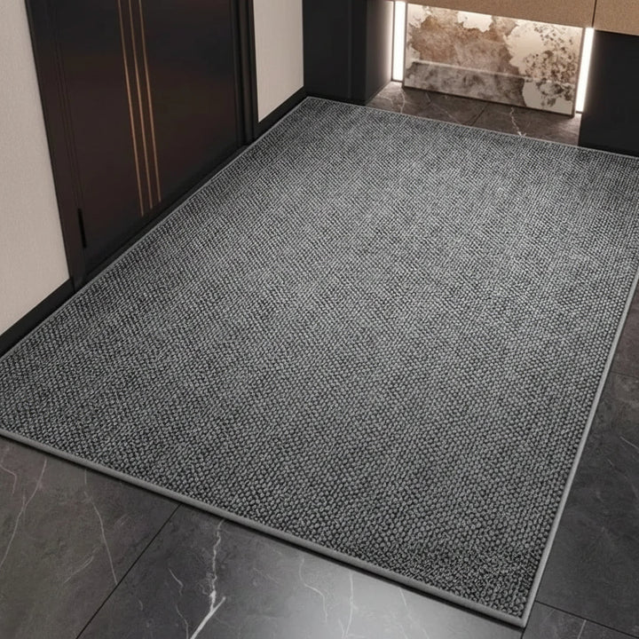 Close-up of textured absorbent non-slip floor mat for bathroom & entryway. Durable anti-slip utility mat.