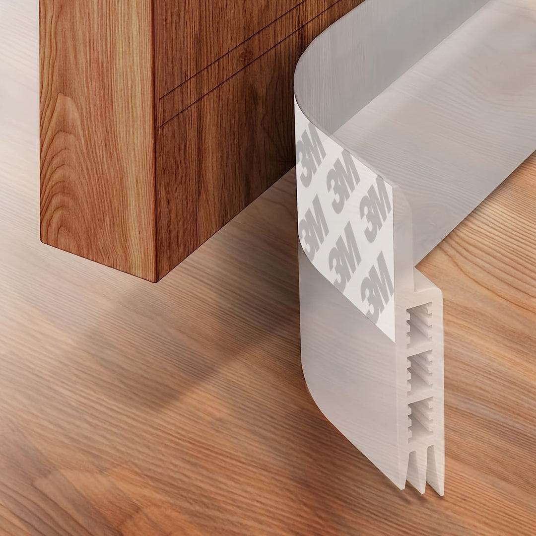 Household door accessory: adhesive draft stopper for energy efficiency & quiet home comfort.