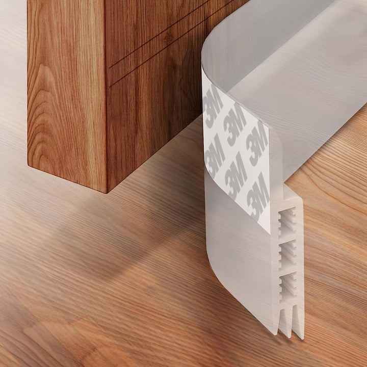 Household door accessory: adhesive draft stopper for energy efficiency & quiet home comfort.