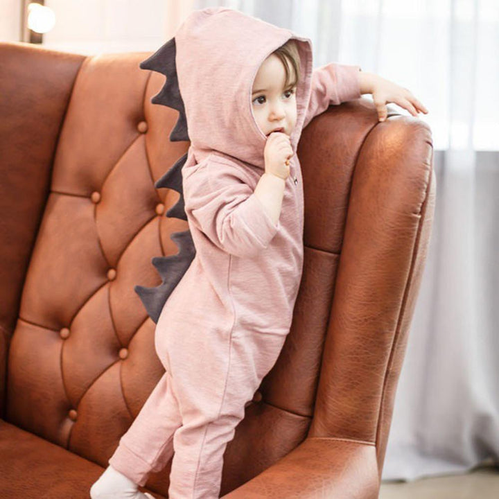 Baby dinosaur outfit with adorable 3D spikes, a cozy onesie for infants & toddlers. Easy-wear baby clothing.