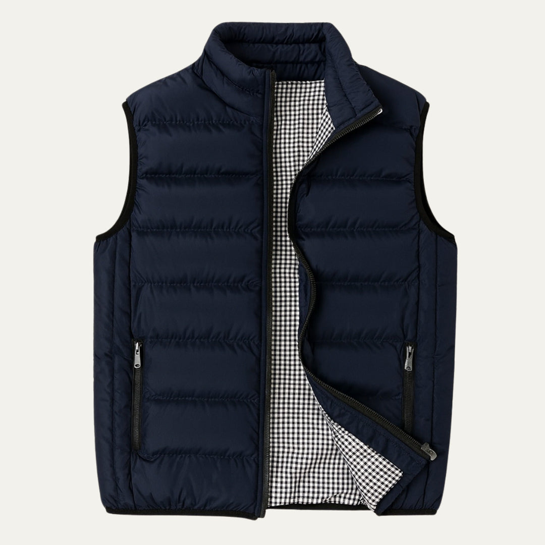 Adrian Men's navy stand collar puffer vest. Quilted, stylish outerwear for winter layering and casual fashion.