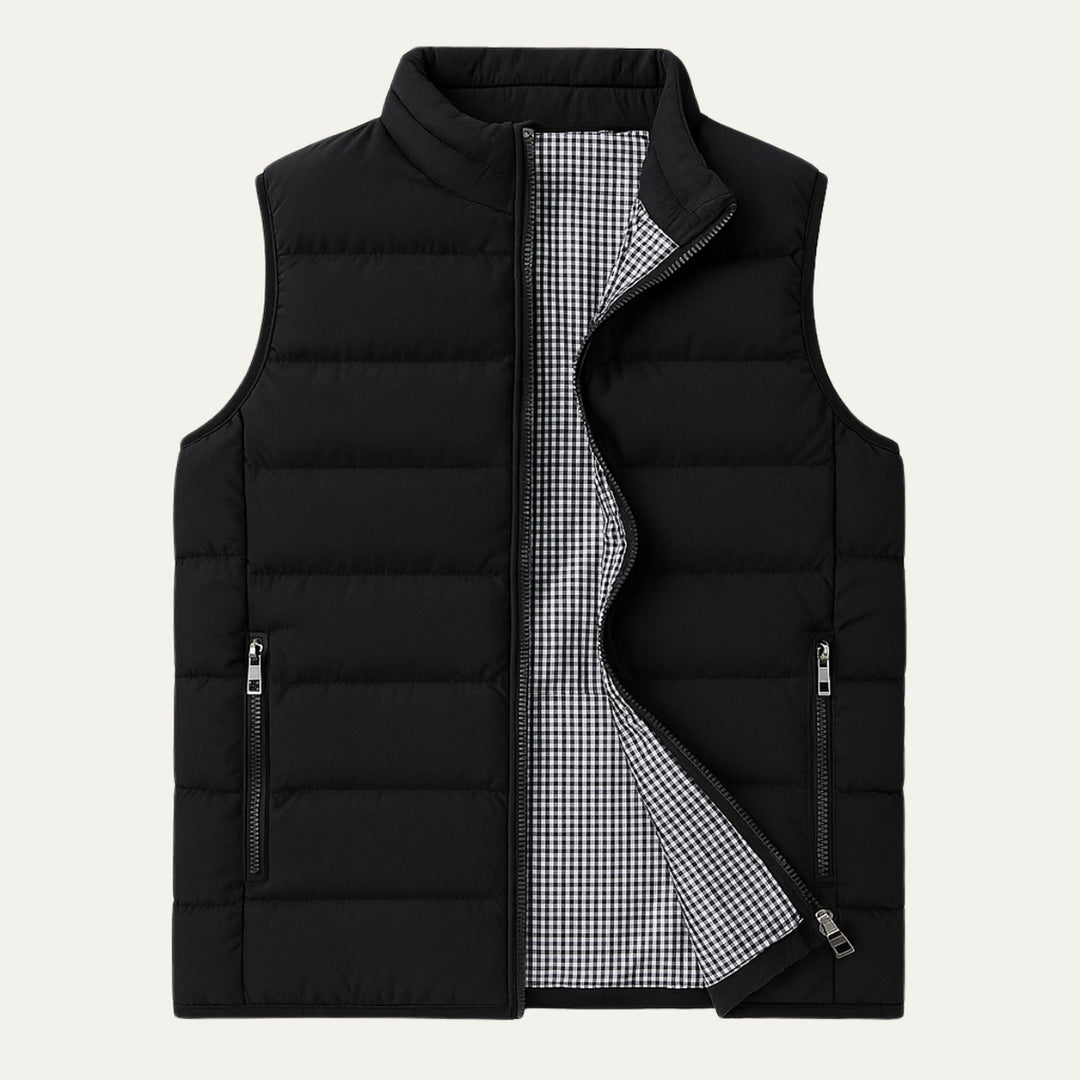 Black Adrian men's puffer vest with stand collar. Perfect quilted outerwear for casual winter fashion & layering.