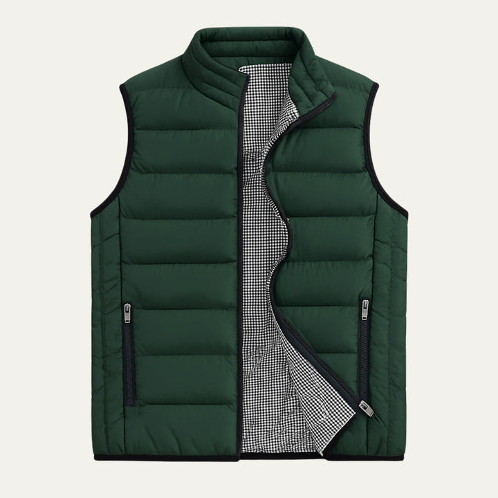 Forest green men's Adrian stand collar puffer vest, a versatile quilted outerwear piece for winter fashion.