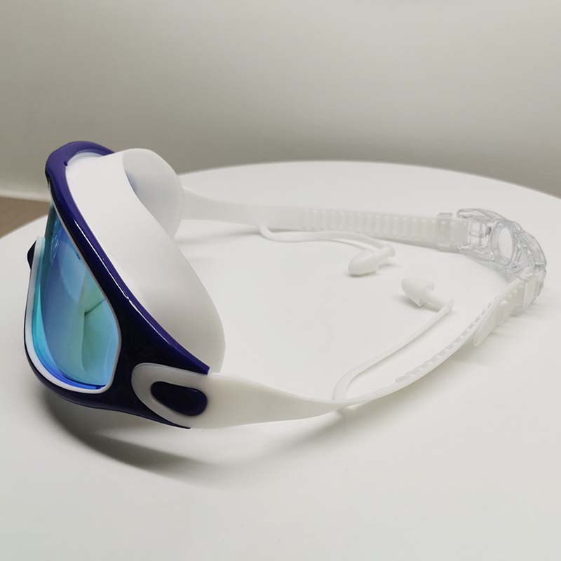 Adult swim goggles, silicone strap, wide view, anti-fog, UV protected for comfortable wear.