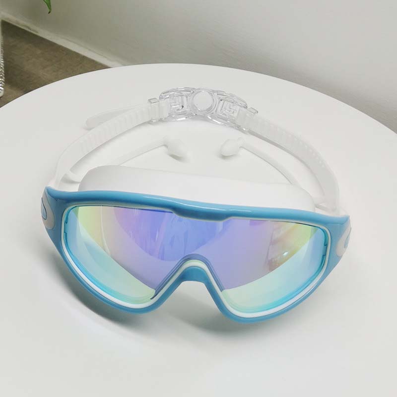 Adult swim goggles with soft silicone frame, wide view, anti-fog, & UV protection.