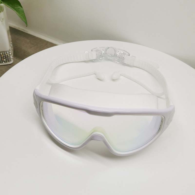 Anti-shatter wide view adult swim goggles with anti-fog & UV protection for safety.
