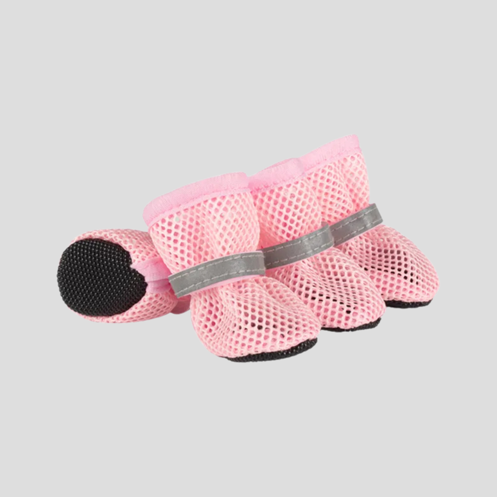 Comfortable pet shoes for dogs & cats. Anti-slip sole design protects paws from rough terrain, heat, and cold.