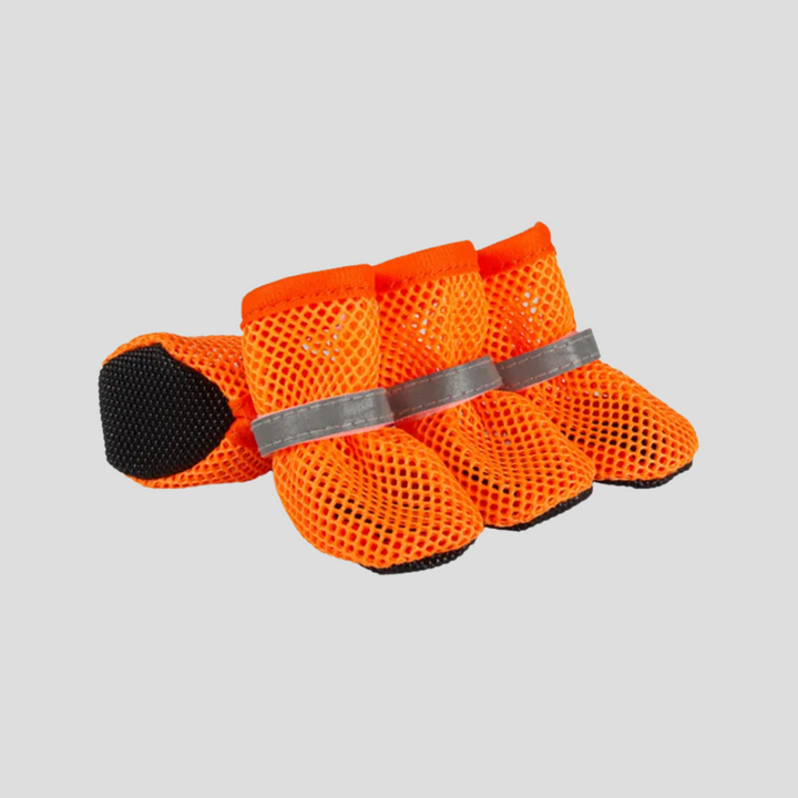 Dog & cat anti-slip paw protectors. Essential pet accessories for traction, protecting paws from elements & injury.