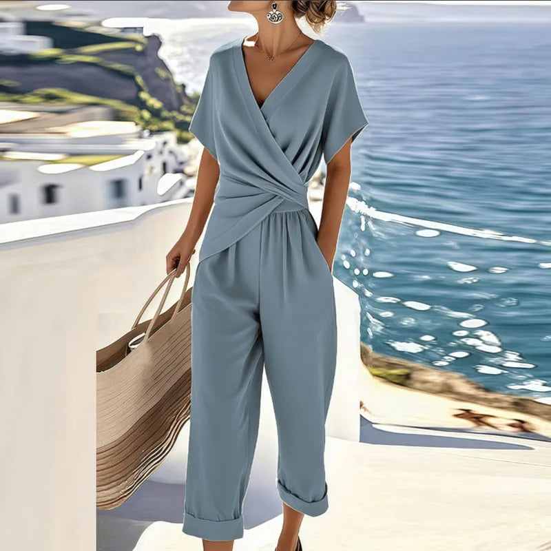 Comfortable blue two-piece set for women with a breathable wrap top & stylish cropped pants, ideal for vacation.