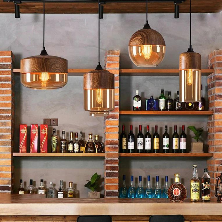 Modern Scandinavian pendant light, Arven, with a glass shade, wood accent, and adjustable ceiling lamp.