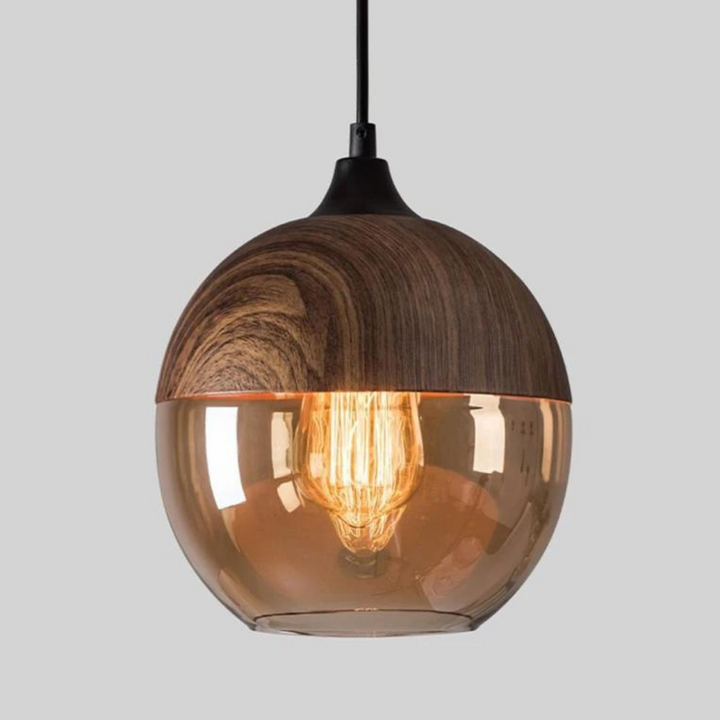 Stylish Arven pendant light, essential home decor for a modern Scandinavian aesthetic, glass and wood.