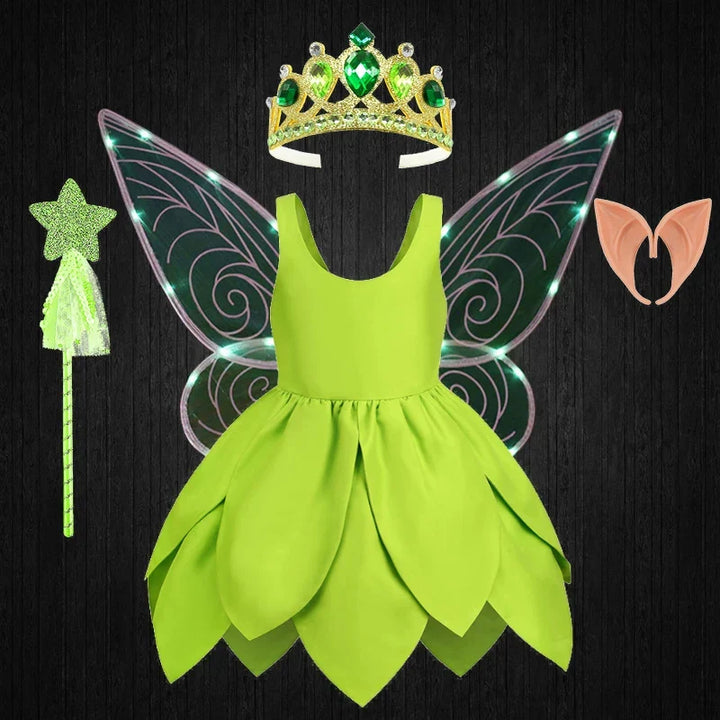 Toddler girl in adorable Tinkerbell fairy costume, perfect for dress-up fun.