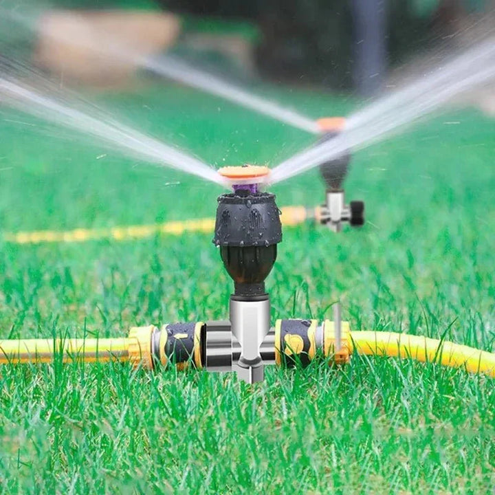 Durable plastic garden sprinkler for automatic plant hydration. Efficient 360° rotating lawn water sprayer.