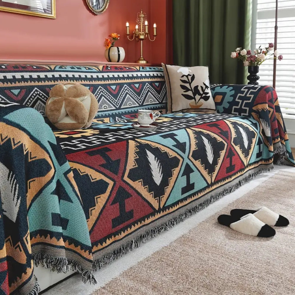Aztec geometric sofa cover in bohemian style for living room decor, protects furniture with unique flair.