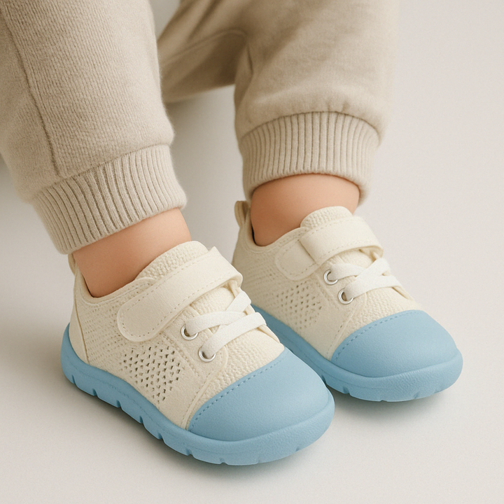 Comfortable baby barefoot sneakers for healthy foot development. Flexible, lightweight design for new walkers.