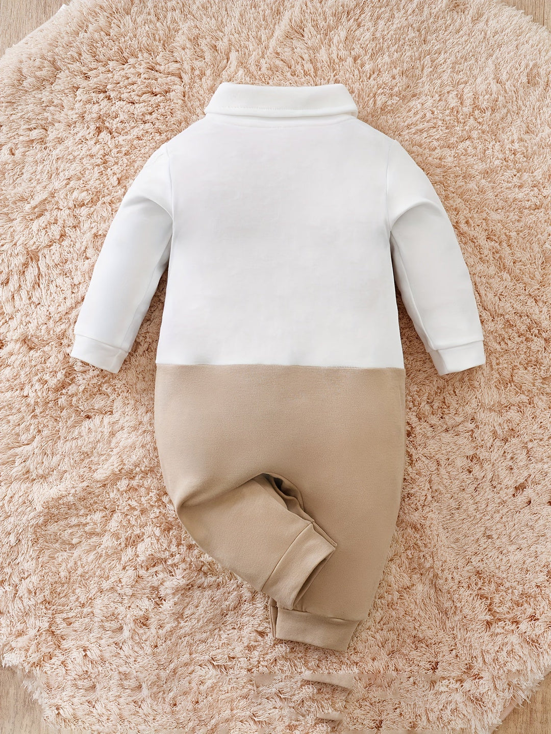 Comfortable cotton baby boy romper, gentleman style with a chic bow tie for all-day wear.