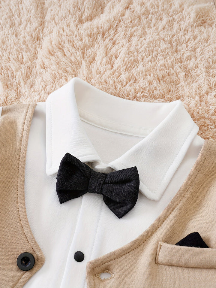 Stylish Oliver gentleman romper for baby boys, featuring a smart bow tie, ideal for parties & events.