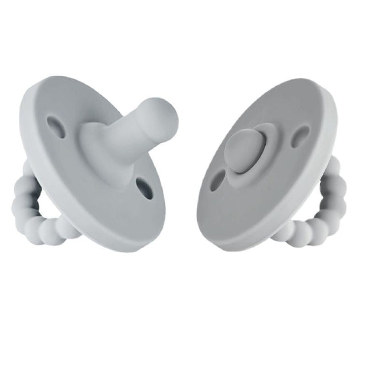 Developmental support with a safe, BPA-free silicone teether and pacifier for infants.