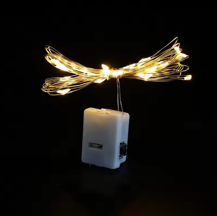 Battery-powered warm white LED fairy string lights, perfect for cozy home decor, bedrooms & Christmas trees.