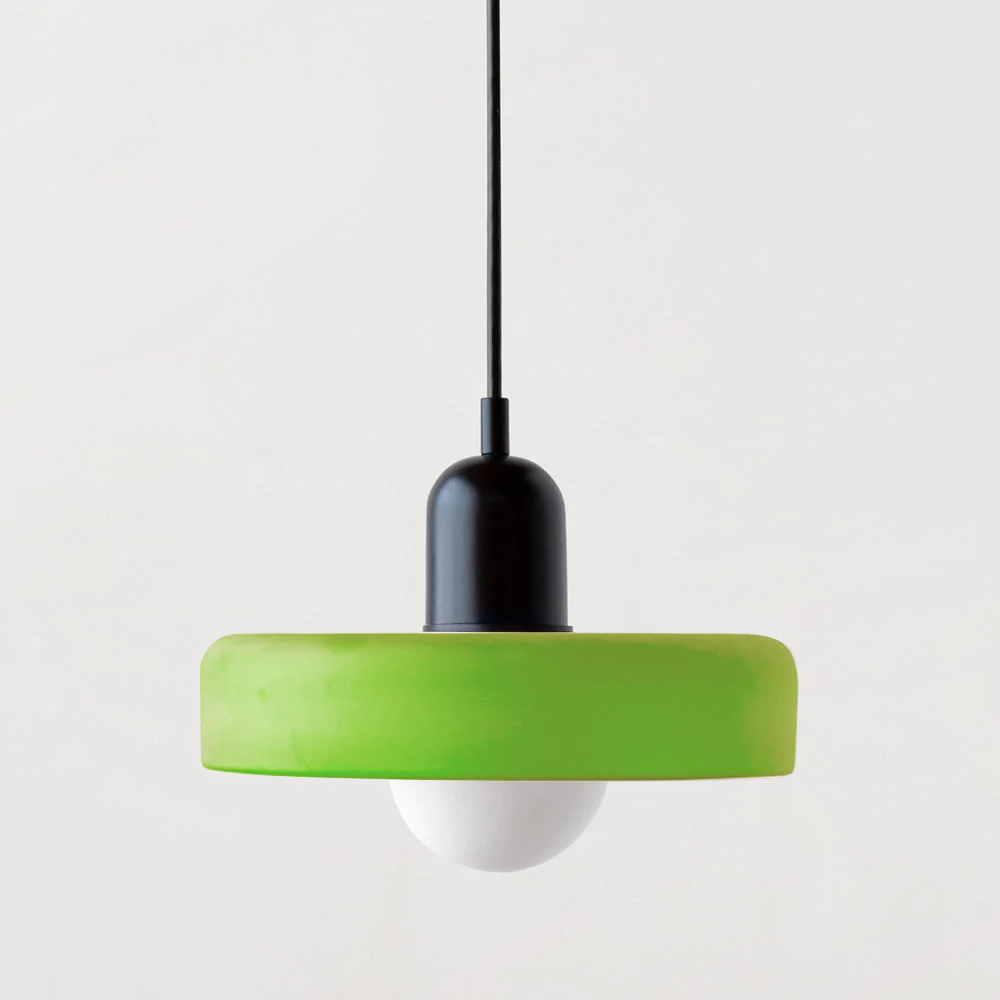 Vibrant colored glass Bauhaus pendant, artistic modern lamp for stylish homes.