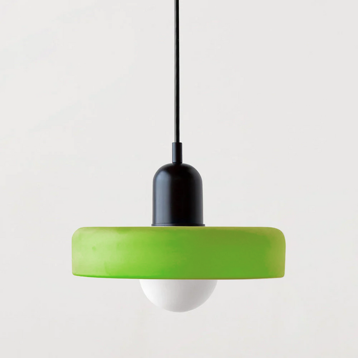 Vibrant colored glass Bauhaus pendant, artistic modern lamp for stylish homes.