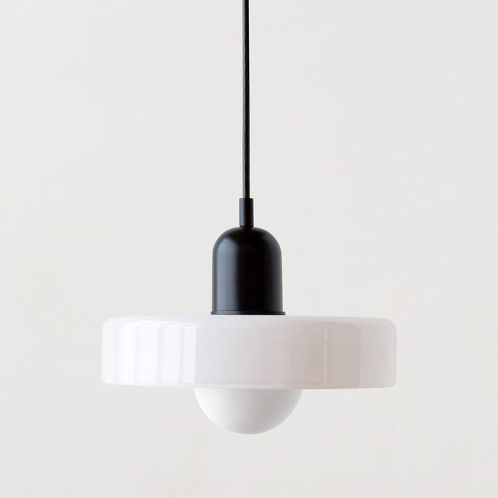 Modern colored glass pendant lamp, Bauhaus style, elegant home decor lighting.