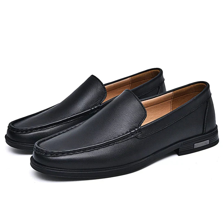 Elegant black men's loafers, perfect dress shoes for a polished, comfortable look.