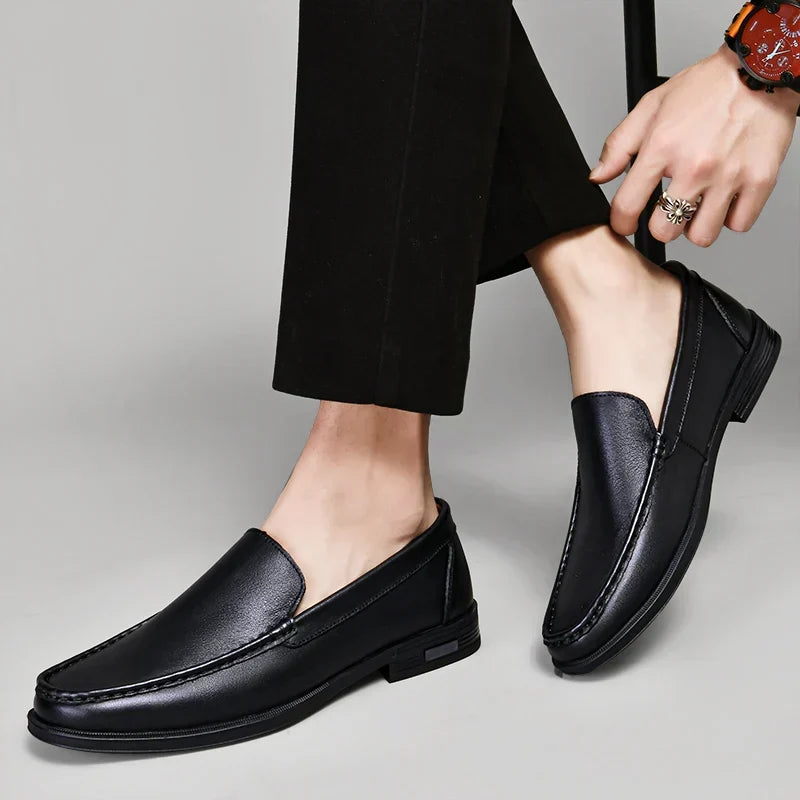 Stylish black loafers for men, essential casual footwear with an elegant touch.
