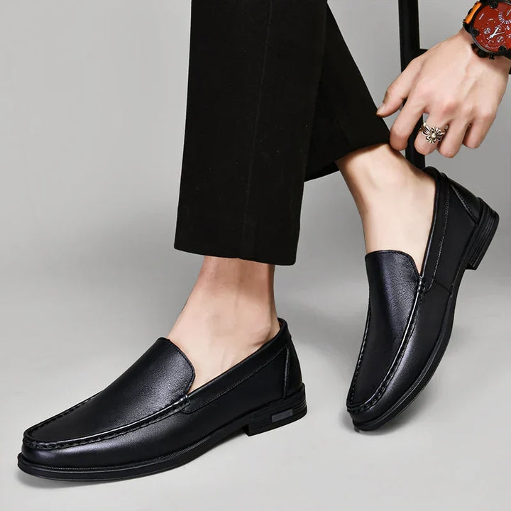 Stylish black loafers for men, essential casual footwear with an elegant touch.