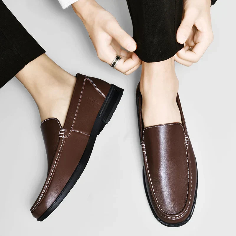 Men's formal casual loafers in black, offering a comfortable, stylish slip-on option.