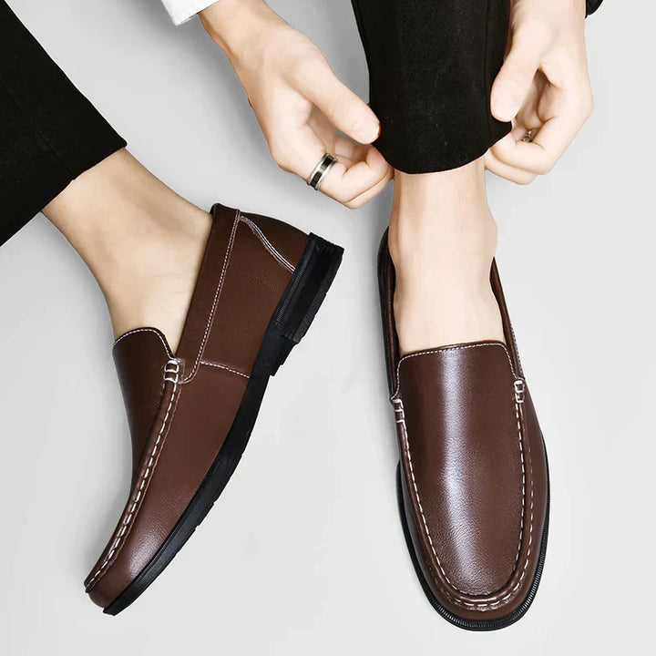 Men's formal casual loafers in black, offering a comfortable, stylish slip-on option.