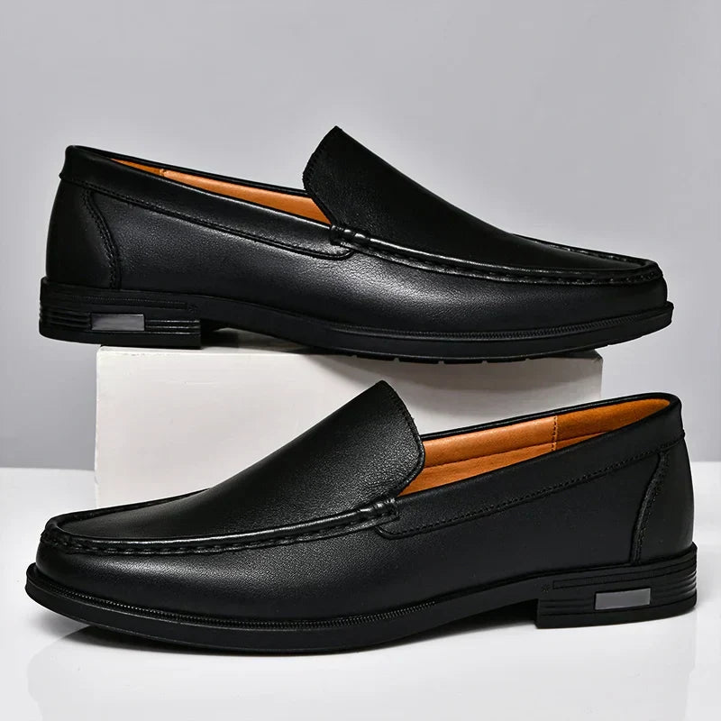 Versatile brown men's loafers, perfect casual footwear for formal or casual occasions.