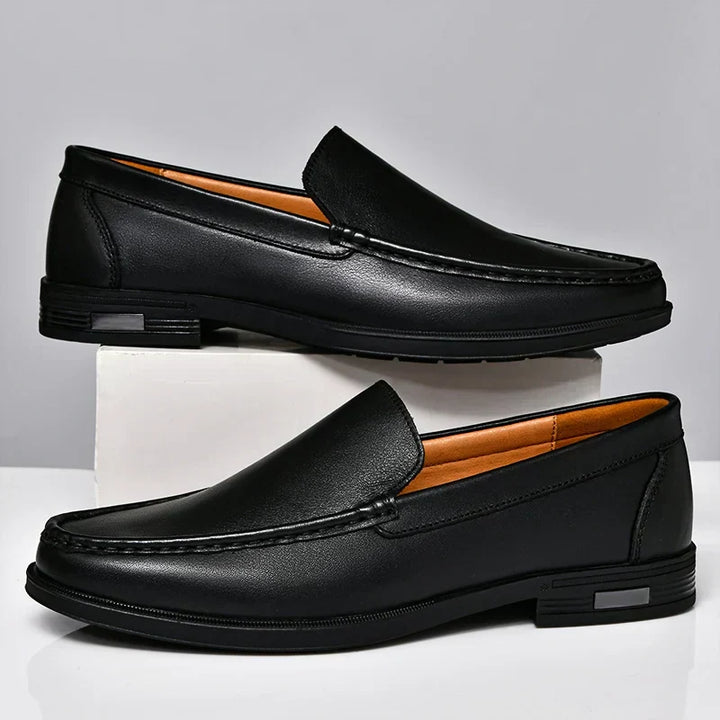 Versatile brown men's loafers, perfect casual footwear for formal or casual occasions.