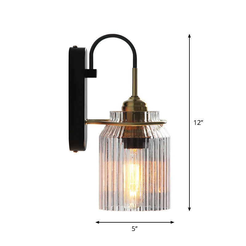 Rustic black farmhouse wall lamp with prismatic shade, ideal as a bedside or hallway light.