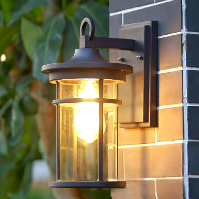 Durable black outdoor wall sconce with industrial design, perfect for garden, patio, and exterior.