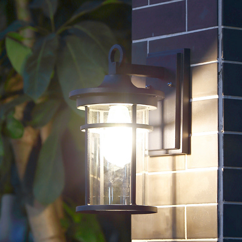 Modern industrial exterior wall light, hardwired black aluminum sconce with E26 base for outdoor use.
