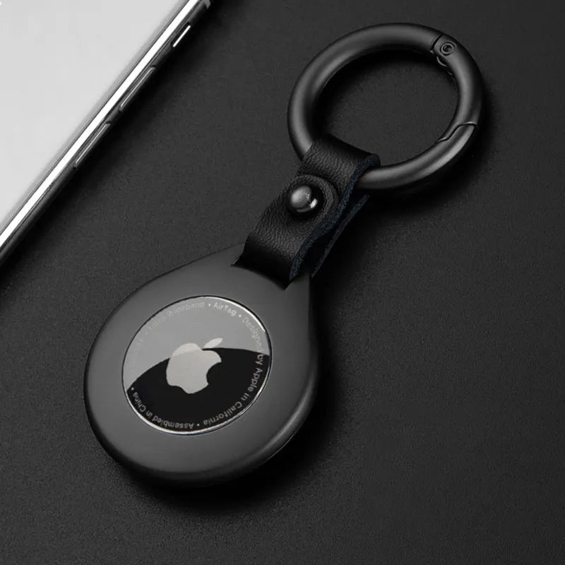 Black leather metal pendant case for item trackers, offering luxury protection.